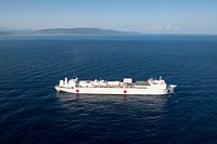 USNS Comfort sails off the coast of Jeremie, Haiti221214-N-DF135-1039 JEREMIE, Haiti (Dec. 14, 2022) The hospital ship USNS Comfort (T-AH 20) sails off the coast of Jeremie, Haiti in support of Continuing Promise, Dec. 14, 2022. Continuing Promise 2022 is a humanitarian assistance and goodwill mission conducting direct medical care, expeditionary veterinary care, and subject matter expert exchanges with five partner nations in the Caribbean, Central and South America. (U.S. Navy photo by Mass Communication Specialist 3rd Class Deven Fernandez)