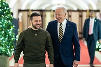 President Joe Biden walks with Ukrainian President Volodymyr Zelenskyy, Wednesday, December 21, 2022, in the Center Hall of the White House. (Official White House Photo by Adam Schultz)