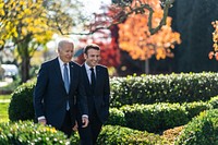 President Joe Biden and French President Emmanuel Macron walk together to a joint press conference in the East Room, Thursday, December 1, 2022, at the White House. (Official White House Photo by Adam Schultz)