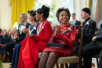 Composer Tonia Leon looks on as President Joe Biden delivers remarks at a reception for Kennedy Center Honorees, Sunday, December 4, 2022, in the East Room of the White House. (Official White House Photo by Adam Schultz)