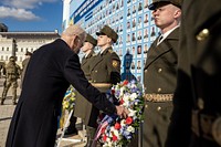 President Joe Biden touches a wreath, Monday, February 20, 2023, at the Wall of the Fallen at St. Michael’s Monastery in Kyiv, Ukraine. (Official White House Photo by Adam Schultz)