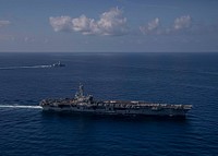 ADRIATIC SEA (March 5, 2023) The Carlo Bergamini-class frigate ITS Virginio Fasan (F 591) and the Nimitz-class aircraft carrier USS George H.W. Bush (CVN 77) transit the Mediterranean Sea, March 5, 2023. The George H.W. Bush CSG is on a scheduled deployment in the U.S. Naval Forces Europe area of operations, employed by U.S. Sixth Fleet to defend U.S., allied and partner interests. (U.S. Navy photo by Mass Communication Specialist 2nd Class Novalee Manzella)