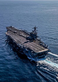 The Nimitz-class aircraft carrier USS George H.W. Bush (CVN 77) transits the Mediterranean Sea.