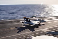 An F/A-18F Super Hornet aircraft, attached to Strike Fighter Squadron (VFA) 103, lands on the flight deck of the Nimitz-class aircraft carrier USS George H.W. Bush (CVN 77), Jan. 27, 2023. Carrier Air Wing (CVW) 7 is the offensive air and strike component of Carrier Strike Group (CSG) 10, George H.W. Bush CSG. The squadrons of CVW-7 are VFA-86, VFA-103, VFA-136, VFA-143, Electronic Attack Squadron (VAQ) 140, Carrier Airborne Early Warning Squadron (VAW) 121, Helicopter Sea Combat Squadron (HSC) 5, and Helicopter Maritime Strike Squadron (HSM) 46. The George H.W. Bush CSG is on a scheduled deployment in the U.S. Naval Forces Europe area of operations, employed by U.S. Sixth Fleet to defend U.S., allied, and partner interests. (U.S. Navy photo by Mass Communication Specialist 3rd Class Chandler Ludke)