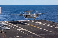 MEDITERRANEAN SEA (Jan. 27, 2023) An E-2D Hawkeye aircraft, attached to Carrier Airborne Early Warning Squadron (VAW) 121, lands on the flight deck the Nimitz-class aircraft carrier USS George H.W. Bush (CVN 77), Jan. 27, 2023. Carrier Air Wing (CVW) 7 is the offensive air and strike component of Carrier Strike Group (CSG) 10, George H.W. Bush CSG. The squadrons of CVW-7 are Strike Fighter Squadron (VFA) 86, VFA-103, VFA-136, VFA-143, Electronic Attack Squadron (VAQ) 140, VAW-121, Helicopter Sea Combat Squadron (HSC) 5, and Helicopter Maritime Strike Squadron (HSM) 46. The George H.W. Bush CSG is on a scheduled deployment in the U.S. Naval Forces Europe area of operations, employed by U.S. Sixth Fleet to defend U.S., allied, and partner interests. (U.S. Navy photo by Mass Communication Specialist 3rd Class Chandler Ludke)