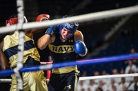 ANNAPOLIS, Md. (Aug. 9, 2022) Midshipmen 4th Class, or plebes, from the United States Naval Academy Class of 2026, participate in a boxing smoker during Plebe Summer, a demanding indoctrination period intended to transition the candidates from civilian to military life. As the undergraduate college of our country's naval service, the Naval Academy prepares young men and women to become professional officers of competence, character, and compassion in the U.S. Navy and Marine Corps. (U.S. Navy photo by 2nd Lt. Duncan Stoner)