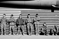 U.S. Soldiers with the New Jersey National Guard's 253rd Transportation Company watch as an F-16C Fighting Falcon aircraft assigned to the New Jersey Air National Guard as it taxi's across the flight line at Bagram Air Field, Afghanistan, Dec. 26, 2011.