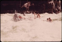 Small (17-foot) raft running Wild Sheep Rapids on the Snake River in Hells Canyon.