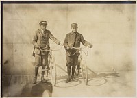 Photograph of Earle Griffith and Eddie Tahoory, working for the Dime Messenger Service in Washington D.C, April 1912. Photographer: Hine, Lewis. Original public domain image from Flickr