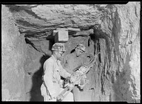 Arthur Roberts and Sam Mynatt drilling in lateral test shaft for examination of substrata at base of Norris Dam, October 1933. Photographer: Hine, Lewis. Original public domain image from Flickr