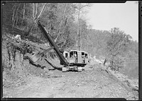 Power shovel making roadway at Norris Dam site, October 1933. Photographer: Hine, Lewis. Original public domain image from Flickr