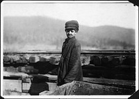Harley Bruce, a young coupling-boy at tipple of Indian Mine, December 1910. Photographer: Hine, Lewis. Original public domain image from Flickr