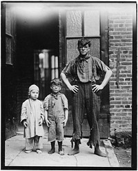 This picture shows the Four Novelty Grahams, acrobatic performers at the Victoria Theatre, Philadelphia, June 1910. Photographer: Hine, Lewis. Original public domain image from Flickr