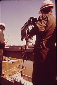 A Monitoring System To Detect Chlorine Leakage Is Set Up By The Environmental Protection Agency After A Barge Carrying Liquid Chlorine Broke Loose From Its Tug, April 1972.  Photographer: Strode, William. Original public domain image from Flickr
