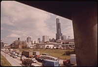 Heavy Traffic On The Dan Ryan Expressway In Chicago Illinois. The Tall Building In The Background Is The Sears Tower, 110 Stories High And The World's Tallest At The Time It Was Built, 10/1973. Photographer: White, John H. Original public domain image from Flickr