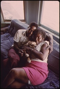 Black Couple And Their Dog In Their Apartment In South Side Chicago, 06/1973. Photographer: White, John H. Original public domain image from Flickr