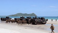 U.S. Marines assigned to the 2nd Assault Amphibian Battalion, 2nd Marine Division conduct amphibious assault training with Thai marines during Cooperation Afloat Readiness and Training (CARAT) 2013 at Hat Yao Beach, Thailand, June 10, 2013.