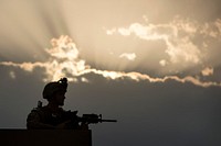 U.S. Air Force Airman 1st Class Alec Blackmon, with the 439th Air Expeditionary Advisory Squadron, provides security at Camp Oqab in Kabul, Afghanistan, July 16, 2013.