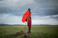 Josphat Mako, Maasai guide and companion to author and travel writer Stuart Butler stands in the Mara North Conservancy adjacent to Kenya's world famous Maasai Mara National Reserve