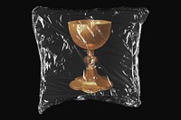 Gold goblet, plastic wrap isolated on black design. Remixed by rawpixel.