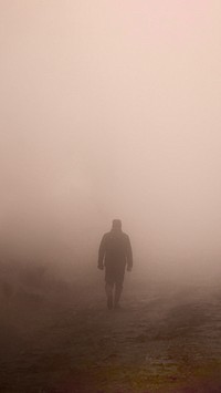 Man in fog mobile wallpaper