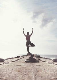 Yoga by sea image with copy space