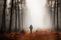 Man walking in mist background design