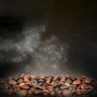 Roasted coffee beans, dark image with copy space