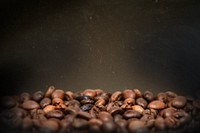 Roasted coffee beans, dark image with copy space