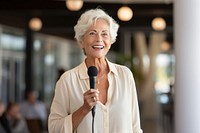 Microphone smiling adult woman. 