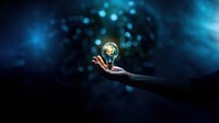 close-up remix photo of hand holding a light bulb with the earth inside. AI generated Image by rawpixel. 