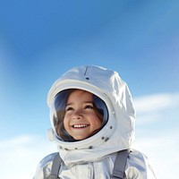 a photo of smiling girl child dressed as astronaut.  