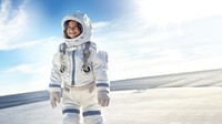 a photo of smiling girl child dressed as astronaut.  