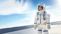 a photo of smiling girl child dressed as astronaut.  