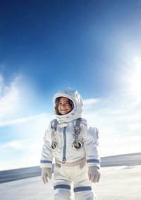 a photo of smiling girl child dressed as astronaut.  