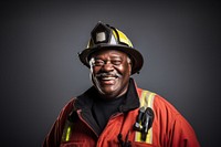 Black Senior firefighter smiling hardhat helmet. 