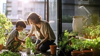 photo a Mother and son watering vegetables in their urban garden. AI generated Image by rawpixel. 