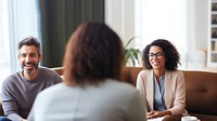 Photo of a psychologist talking to a man. 