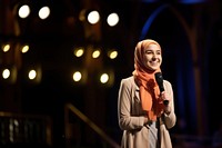 Muslim woman, public speaking. AI generated Image by rawpixel.