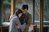 Asia young people stress hugging adult woman. 