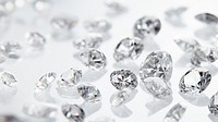 Sparkling diamonds on white background.