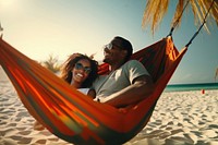 Couple on a hammock. AI generated Image by rawpixel.