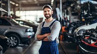 Photo of a maintenance male checking automobile service.  