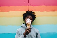 Black kid eating ice cream telephone portrait headshot. 