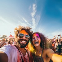 Couple taking selfie festival laughing adult. 