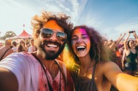 Couple taking selfie festival laughing glasses. 