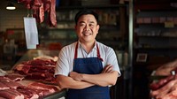 photo of local meat shop asian happy owner in front, natural light.  