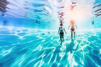 Couple swimming, underwater shot. 