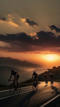 side view Photo of 3 man bicycling on the mountain road, sunset.  