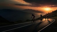 side view Photo of 3 man bicycling on the mountain road, sunset.  